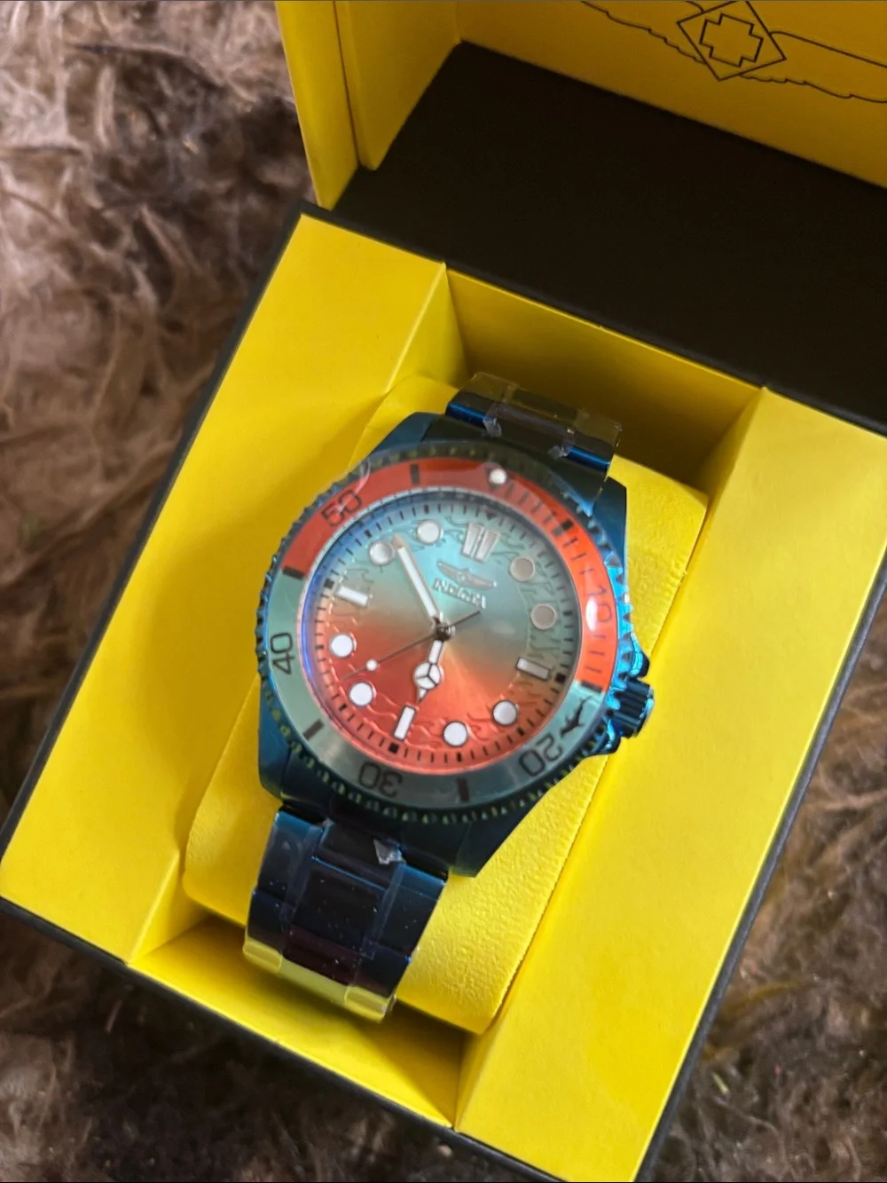 Invicta blue and orange stainless steel diver watch